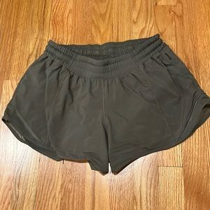 Lululemon size 6 racing shorts in hunter green. Good condition